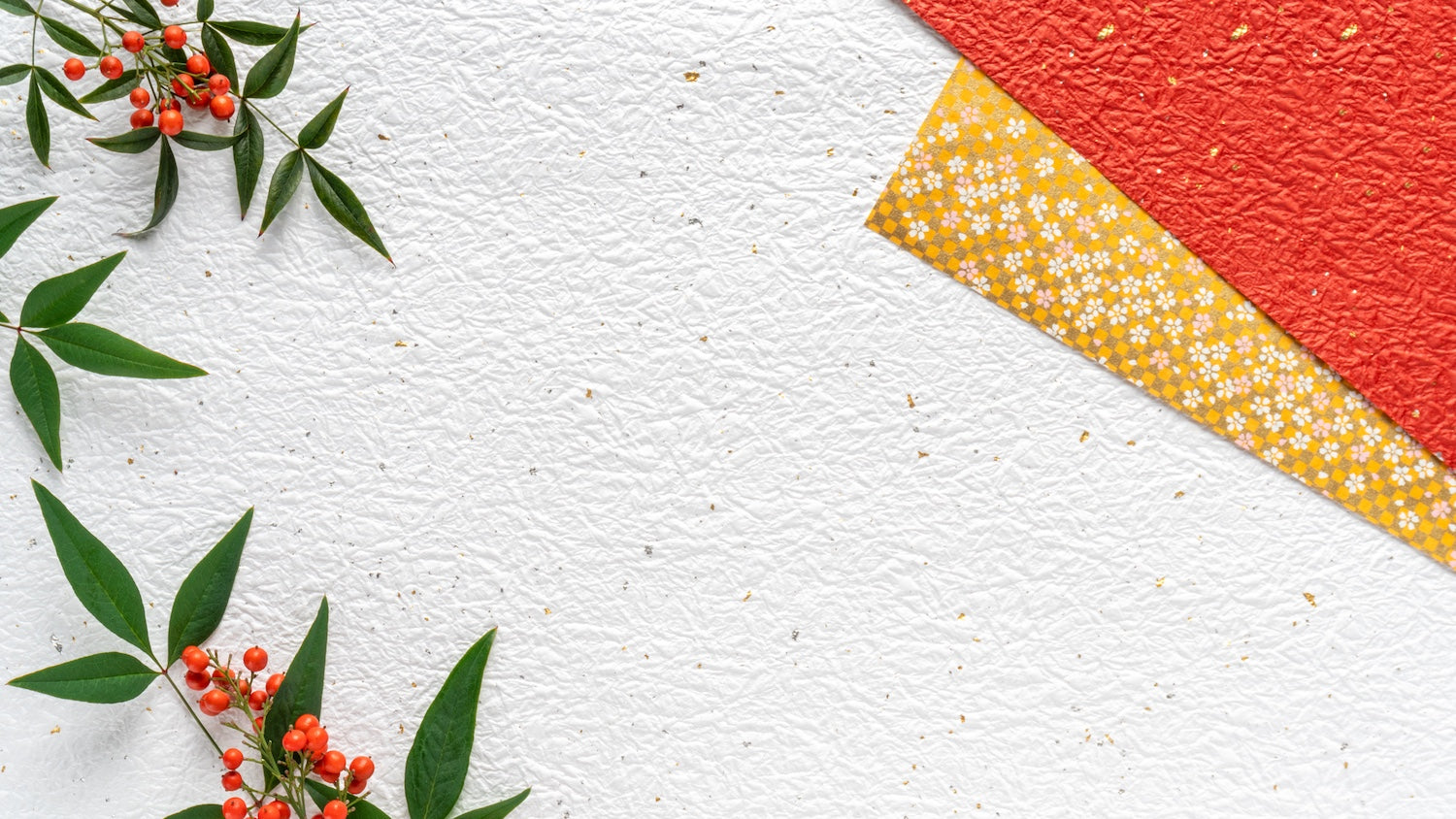 samples of washi paper and nandina berries