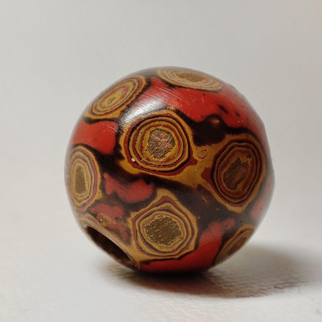 close-up of ojime bead
