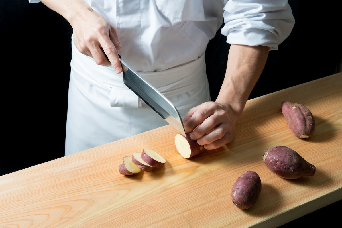 cutting satsuma imo with japanese knife