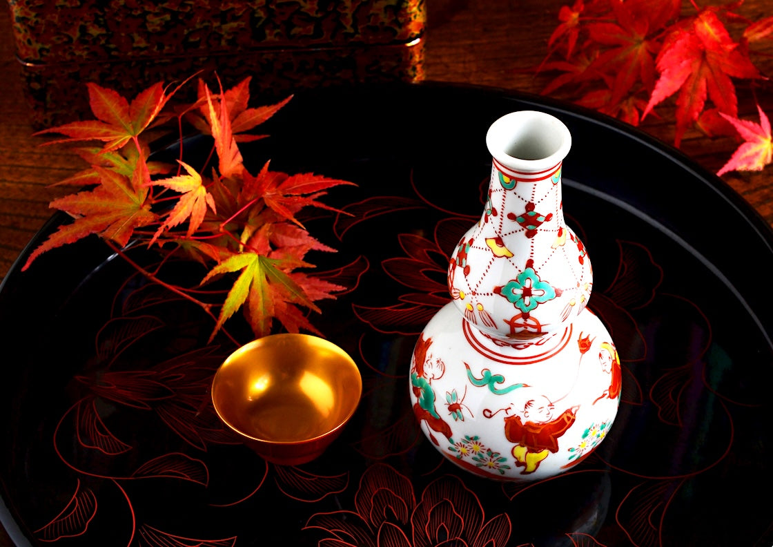 maple leaves with sake tokkuri and cup